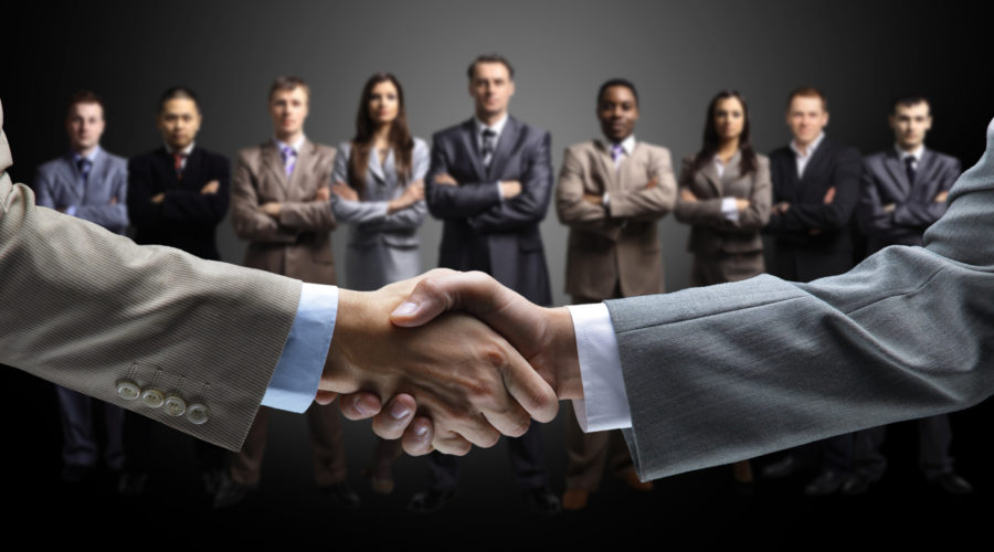 handshake isolated on business background